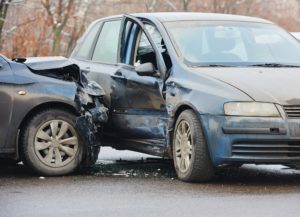 Distracted driver causing car accident in Fort Novosel Alabama.