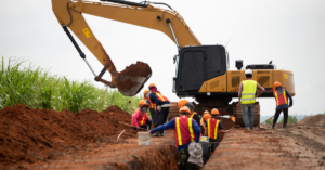 Group of worker and construction engineer wear safety uniform excavation water.